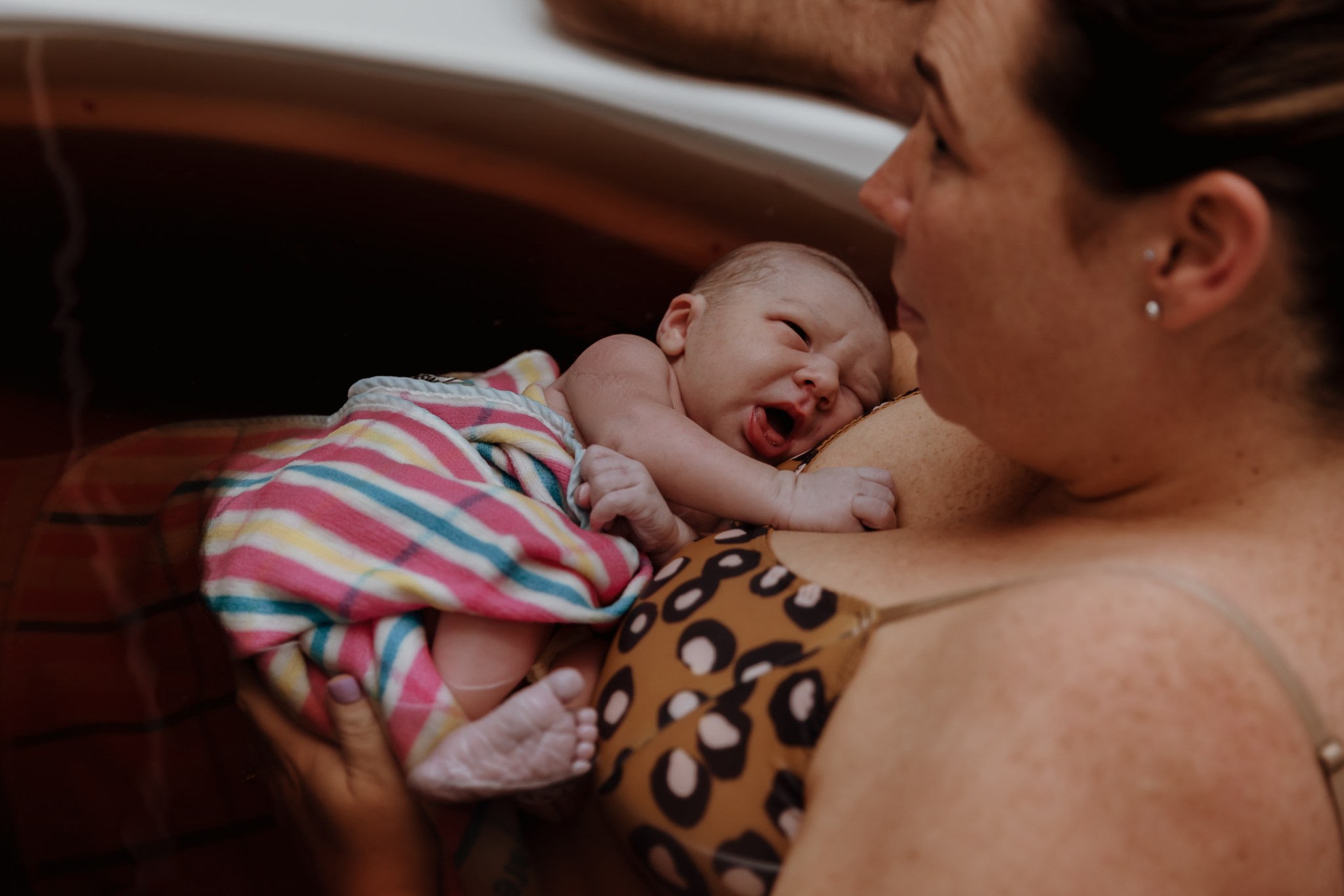 Birth photography Sydney, parents with newborn